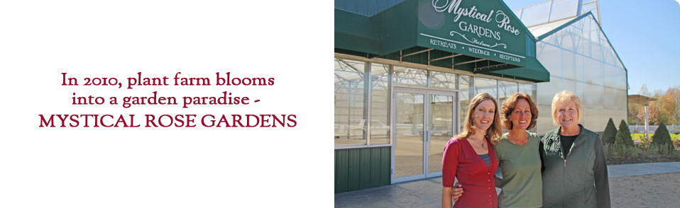 A group of women standing in front of a greenhouse with the words in plant from blooms into a garden.