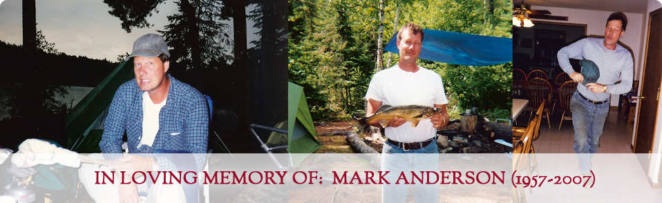 A photo of a man holding a fishing pole.