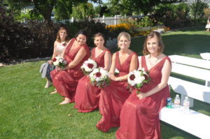 Brides maid holding flowers at the wedding