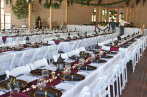 Long view of the dining tables arranged in the wedding