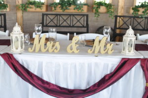 Mr and mrs letters arranged on the table