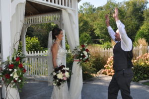 Bride and groom dancing at the event