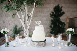 Wedding cake on the table with candles