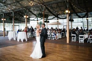 Bride and groom holding each other at the wedding