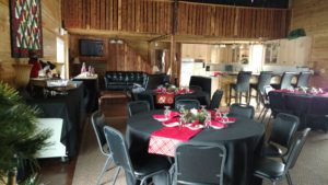 Dining tables with black and red cloths on display