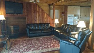 Black sofas in the living area