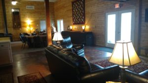 A living room in a log cabin.