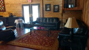 A living room with couches and a coffee table.