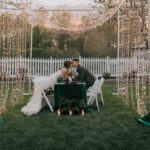 Bride and groom kissing each other