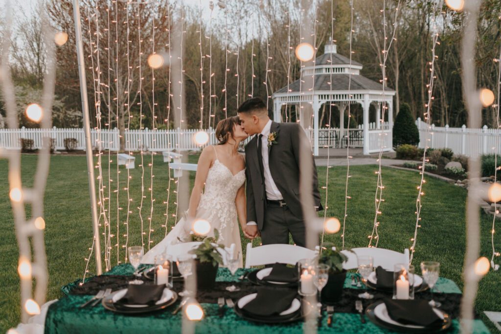 Bride and groom kissing each other