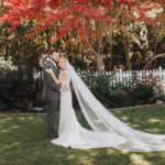 Bride and groom posing for a picture