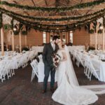 Bride and groom kissing each other