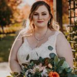 Close headshot of bide holding bouquet