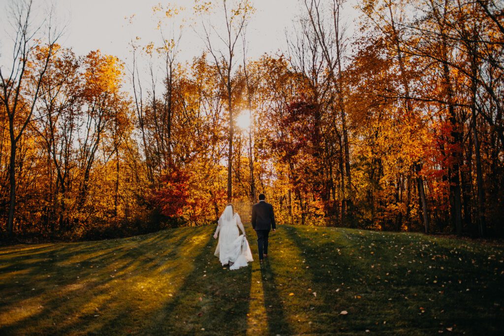 Bride and groom walking long shot