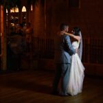 Bride and groom posing hugging each other