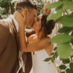 Bride and groom kissing closeup shot